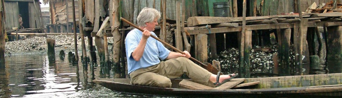 Lars Soeftestad, paddling boat in Nigeria